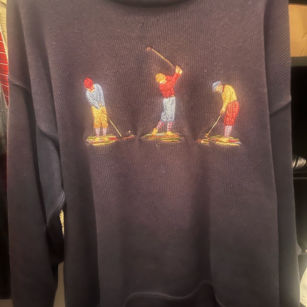 Mens golf embroidered (intarsia) worn but not abused color navy